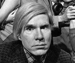Andy Warhol with the cast of his play "Pork" at La Mama, signed by Jack Mitchell