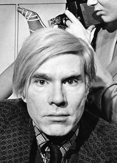 Andy Warhol with the cast of his play "Pork" at La Mama, signed by Jack Mitchell
