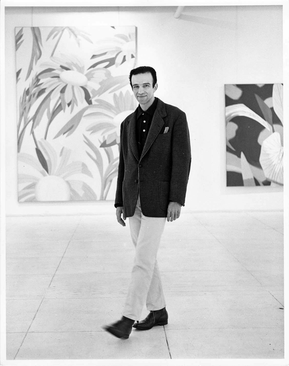 11 x 14" vintage silver gelatin photograph of artist Alex Katz at an exhibition of his recent works in Manhattan, 1964. Signed by Jack Mitchell on the print verso. Comes directly from the Jack Mitchell Archives with a certificate of authenticity.