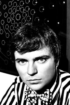 Artist John Willenbecher at an exhibition of his work