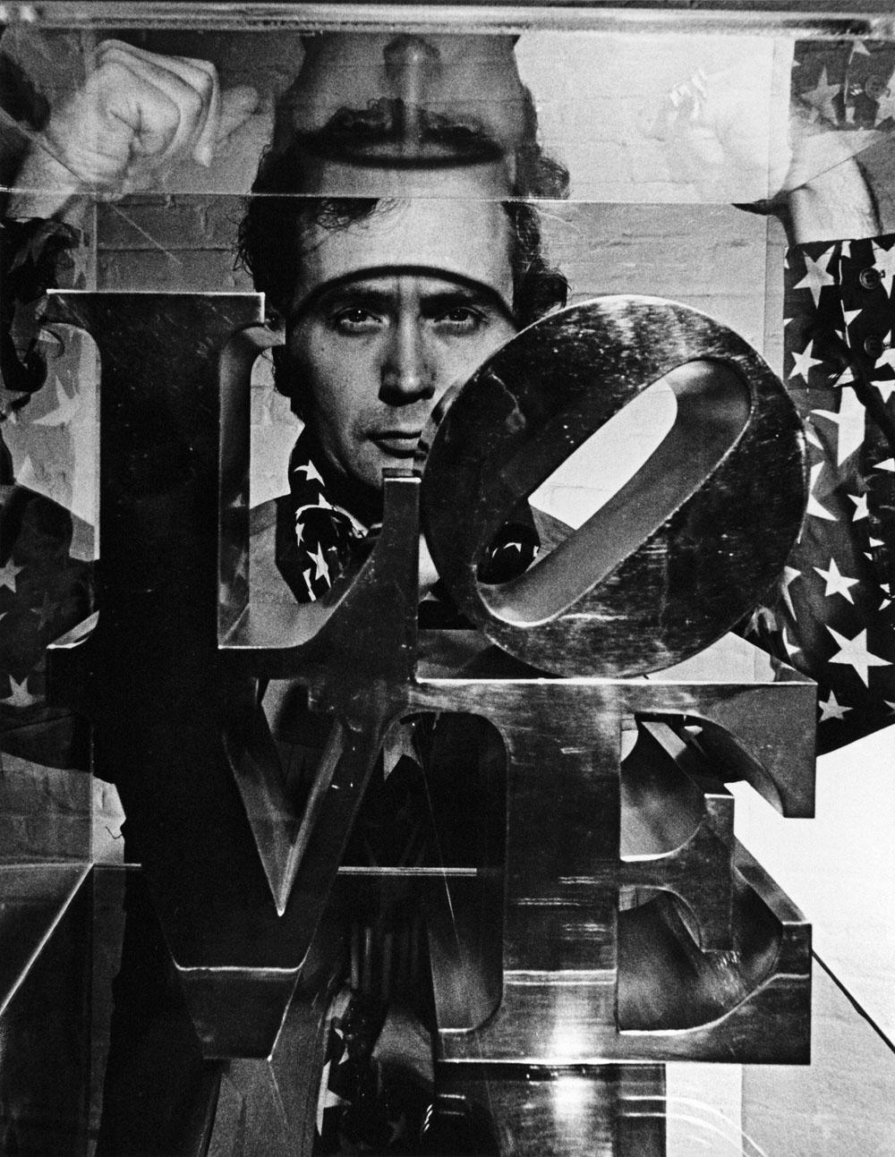   Artist Robert Indiana with his LOVE sculpture, signed By Jack Mitchell 