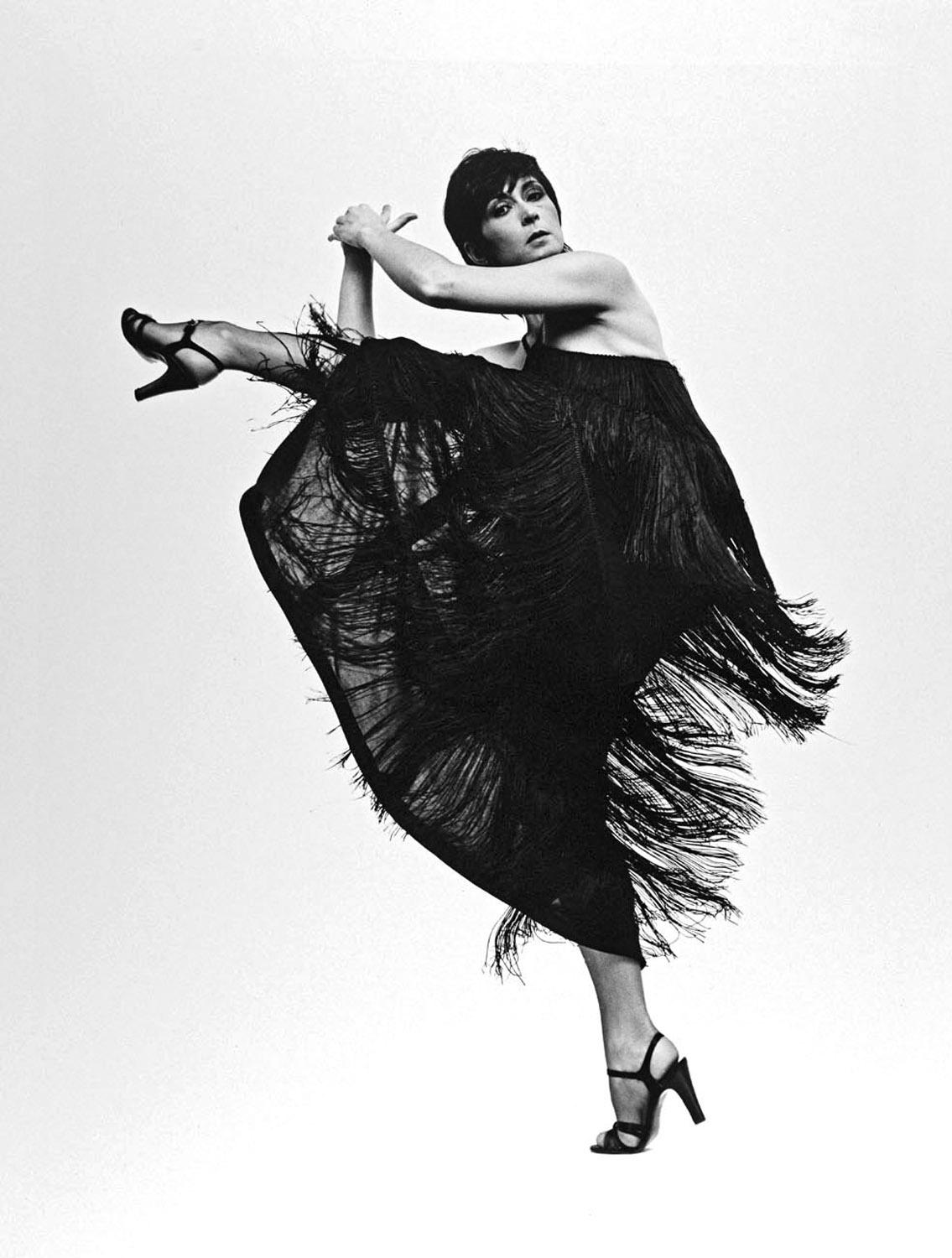 Jack Mitchell Black and White Photograph -  Choreographer/Dancer Twyla Tharp captured in her classic ‘Vida Blue’ pose
