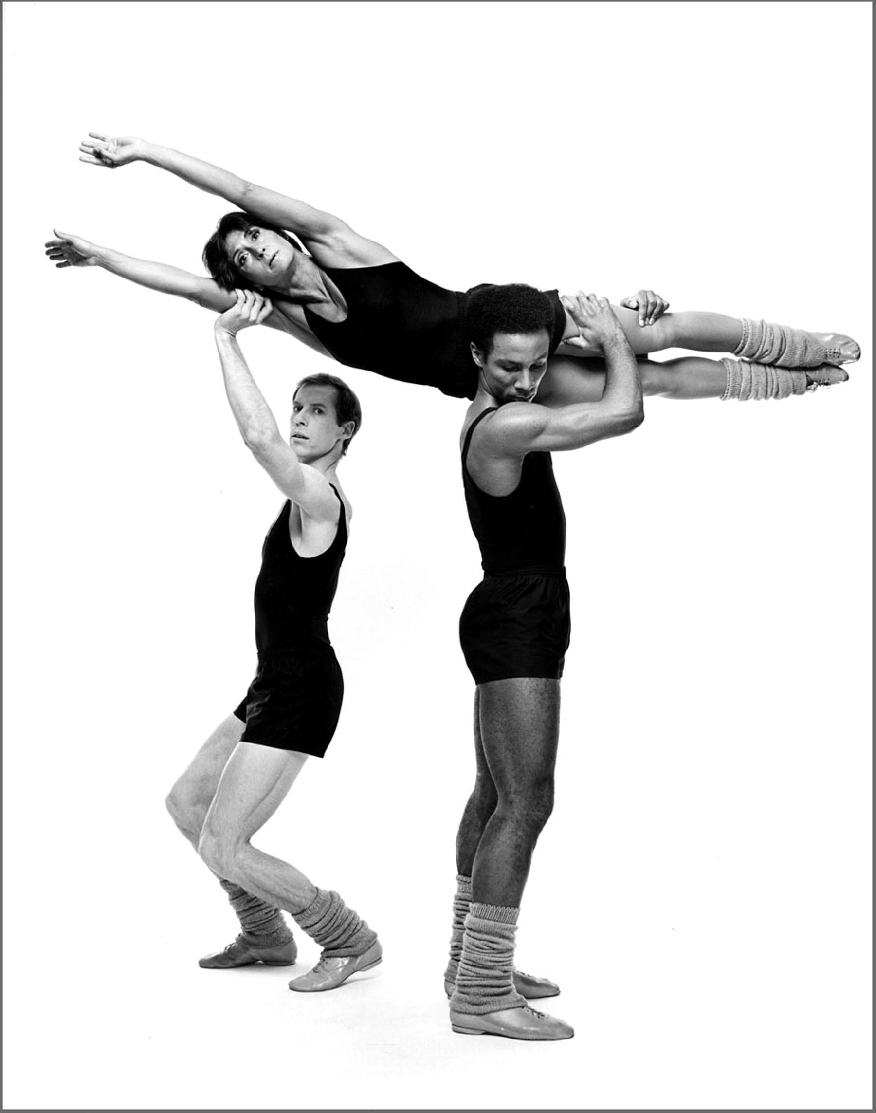 Jack Mitchell Black and White Photograph - Dance Company Founder Twyla Tharp held aloft by her dancers