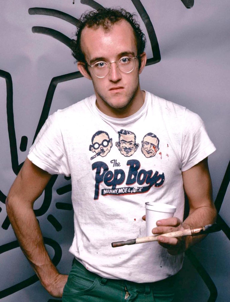 Graffiti artist Keith Haring photographed with his work - Photograph by Jack Mitchell