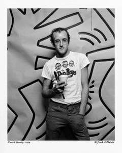 Graffiti artist Keith Haring with just completed work, signed by Jack Mitchell