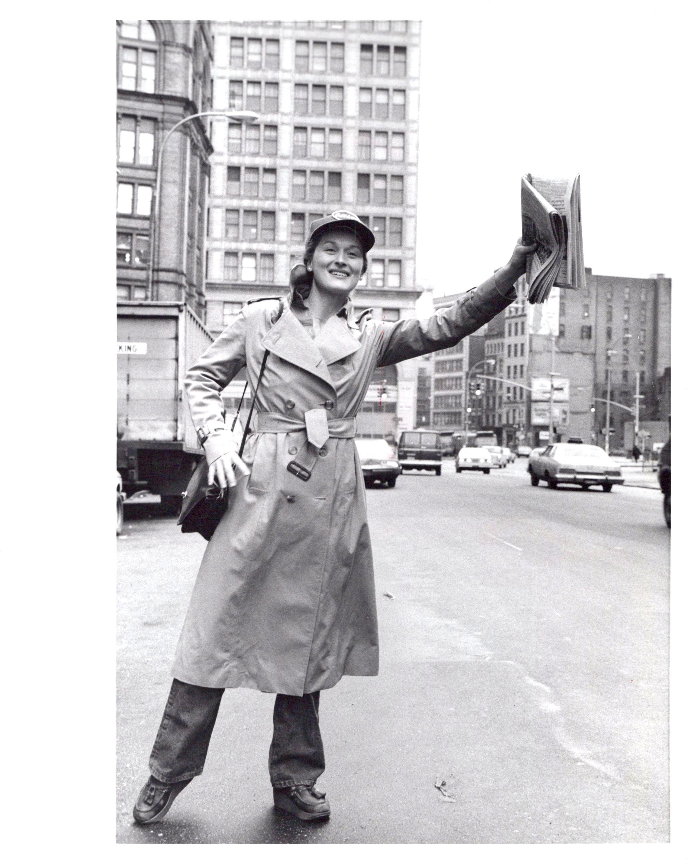 Jack Mitchell Black and White Photograph - Meryl Streep hailing a cab outside of Joseph Papp's Public Theater in Manhattan