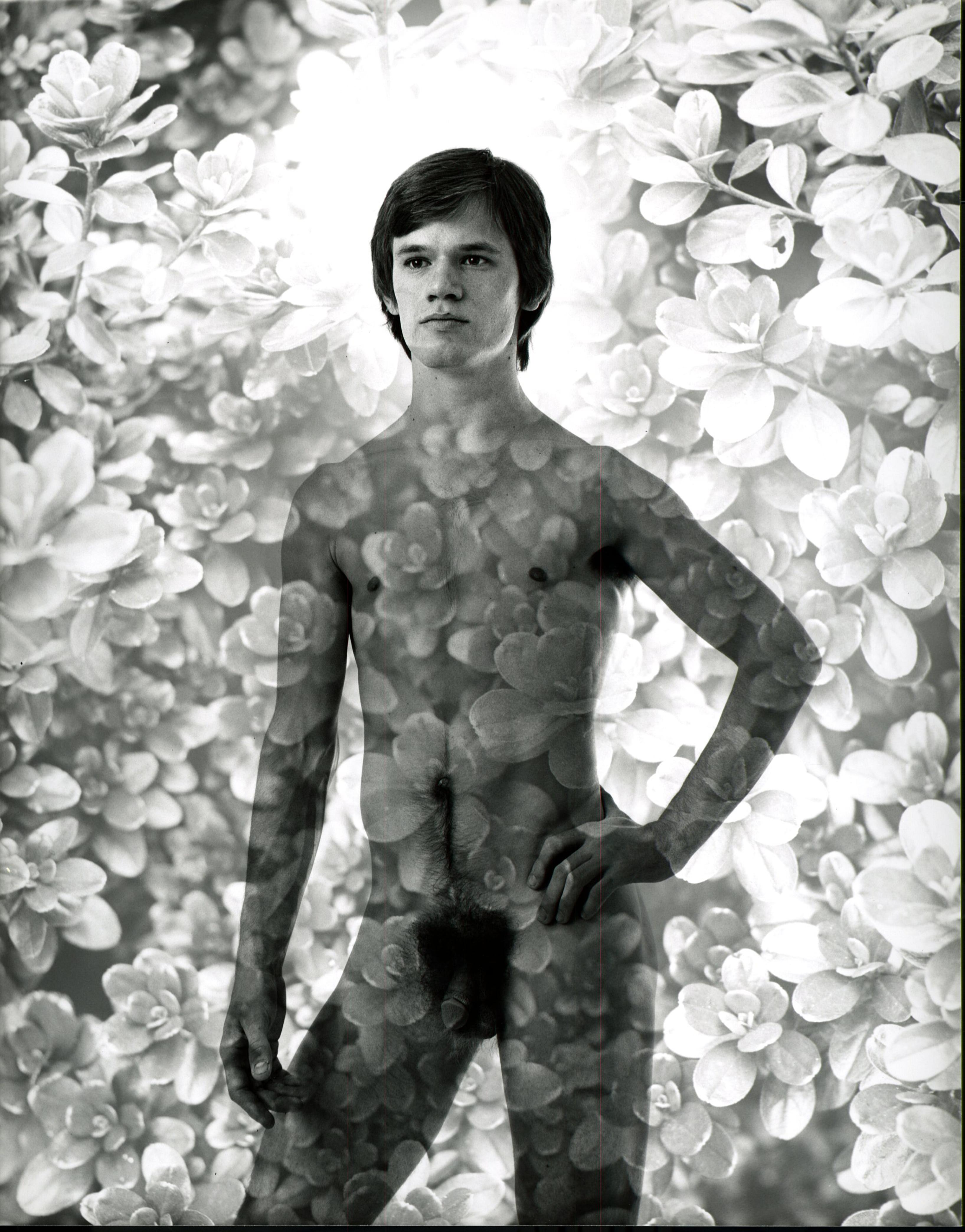 Jack Mitchell Black and White Photograph - Nude male model multiple exposure with plant leaves