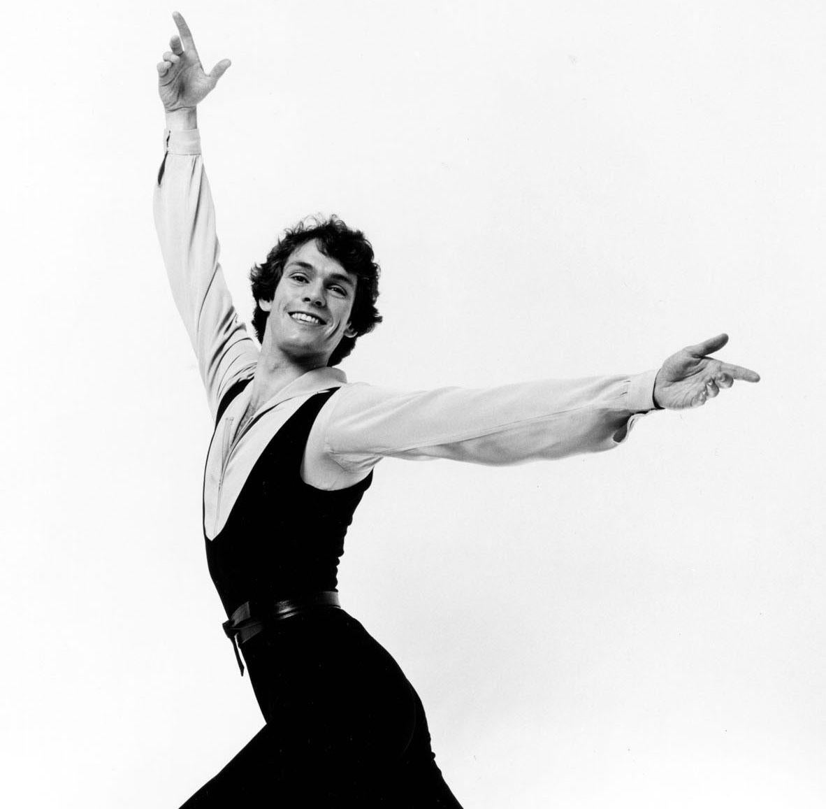 Olympic Gold Medal winning British figure skater John Curry, signed by Mitchell - Photograph by Jack Mitchell