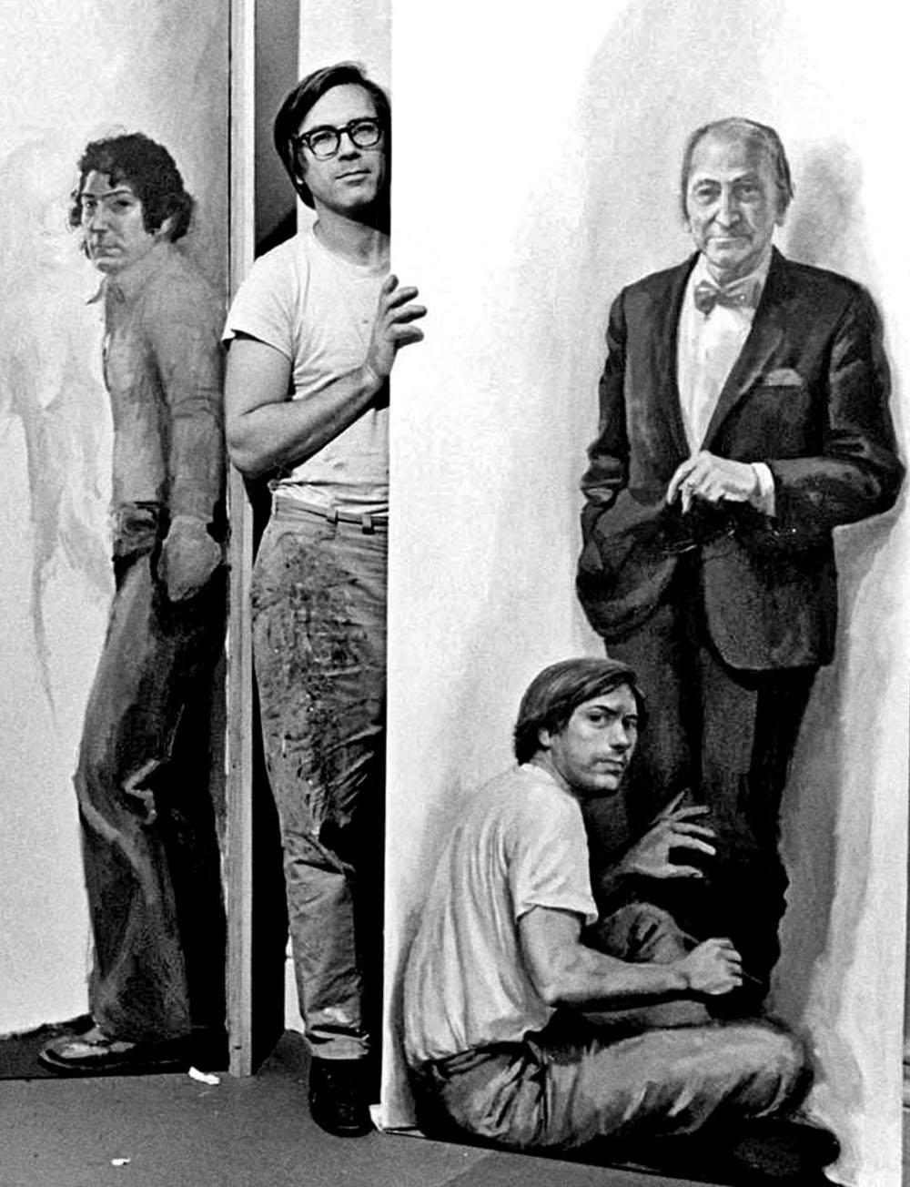 Painter Willard Midgette posing with his paintings - Photograph by Jack Mitchell