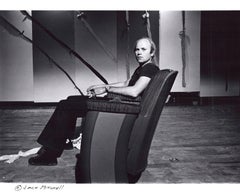 Pop artist James Rosenquist photographed with his work 