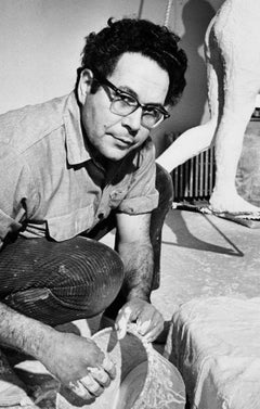 Sculptor George Segal working in his studio