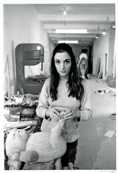 Sculptor Marisol (Maria Sol Escobar) in her studio, signed by Jack Mitchell