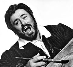 Tenor Luciano Pavarotti performing in full costume for 'La Bohème' at the MET