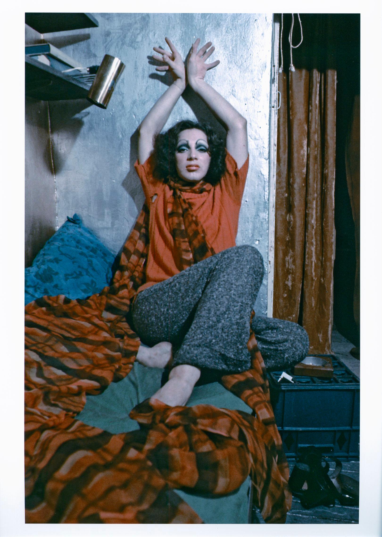 Jack Mitchell Color Photograph - Warhol Superstar Holly Woodlawn in her Greenwich Village apartment