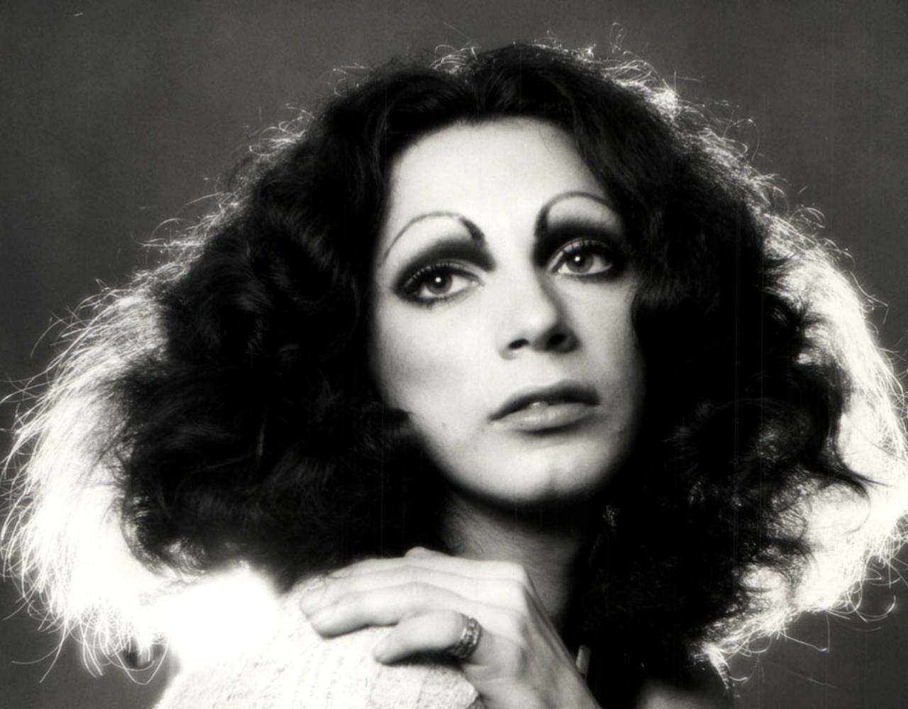 Warhol Superstar Holly Woodlawn, studio portrait retouched for publication - Photograph by Jack Mitchell
