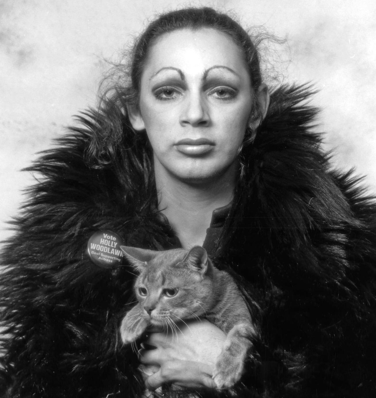 Warhol Superstar Holly Woodlawn with Jack Mitchell's studio cat 'Nik' (named for his favorite camera Nikon), 1971. 13 x 19” archival pigment print. (Photograph © Jack Mitchell - All rights reserved.)

Comes directly from the Jack Mitchell Archives. 