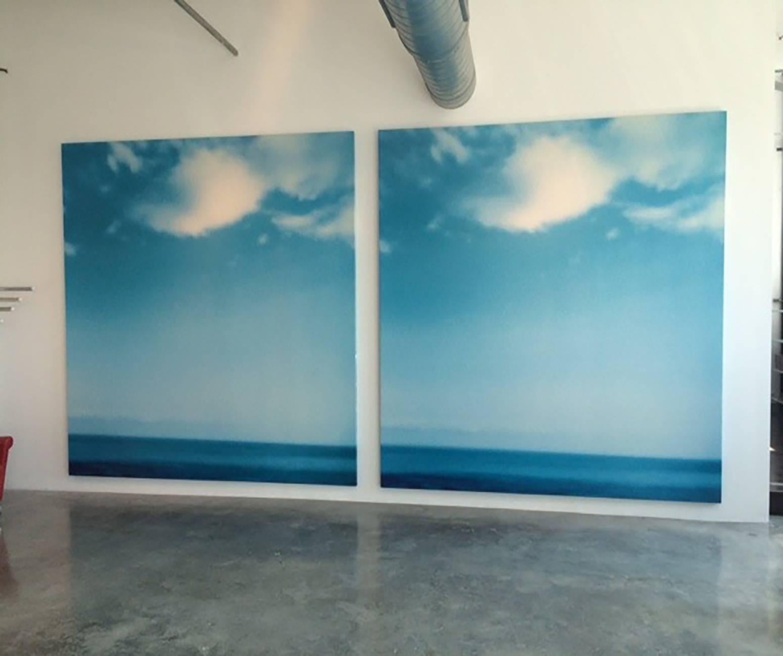 "Blue Horizon" by Jack Pierson is a diptych, consisting of two canvases each measuring 107.1 x107.1 inches.  The artwork was created in 1997 from acrylic and lacquer that were digitally sprayed on canvas.  The image is of the ocean horizon, derived