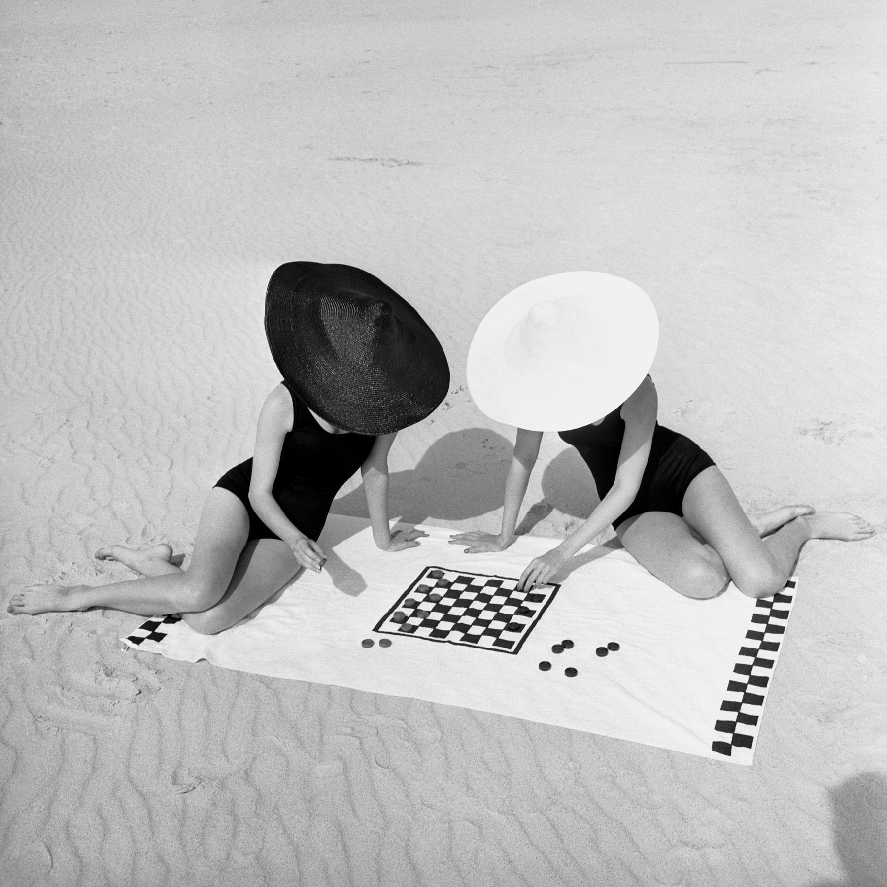 Jack Robinson Black and White Photograph - Hats on the Beach, Silver Gelatin Print