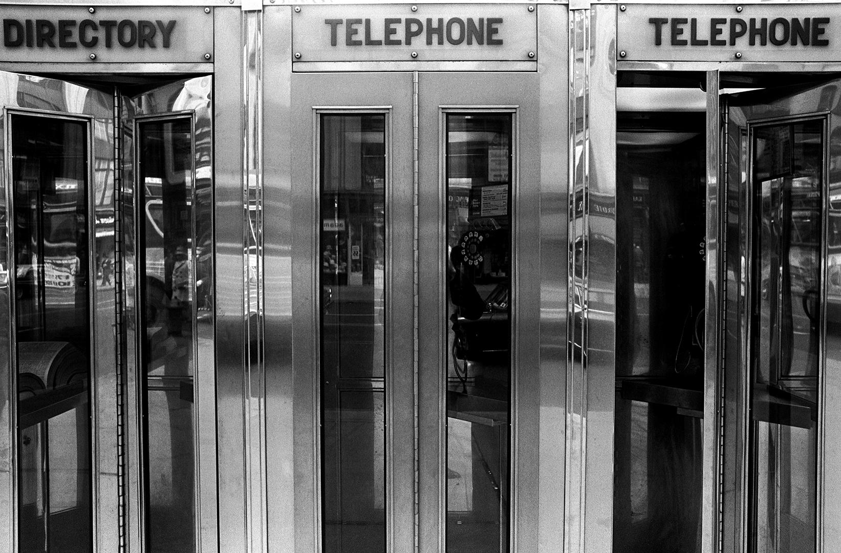 Jack Robinson Black and White Photograph - Telephone Booths