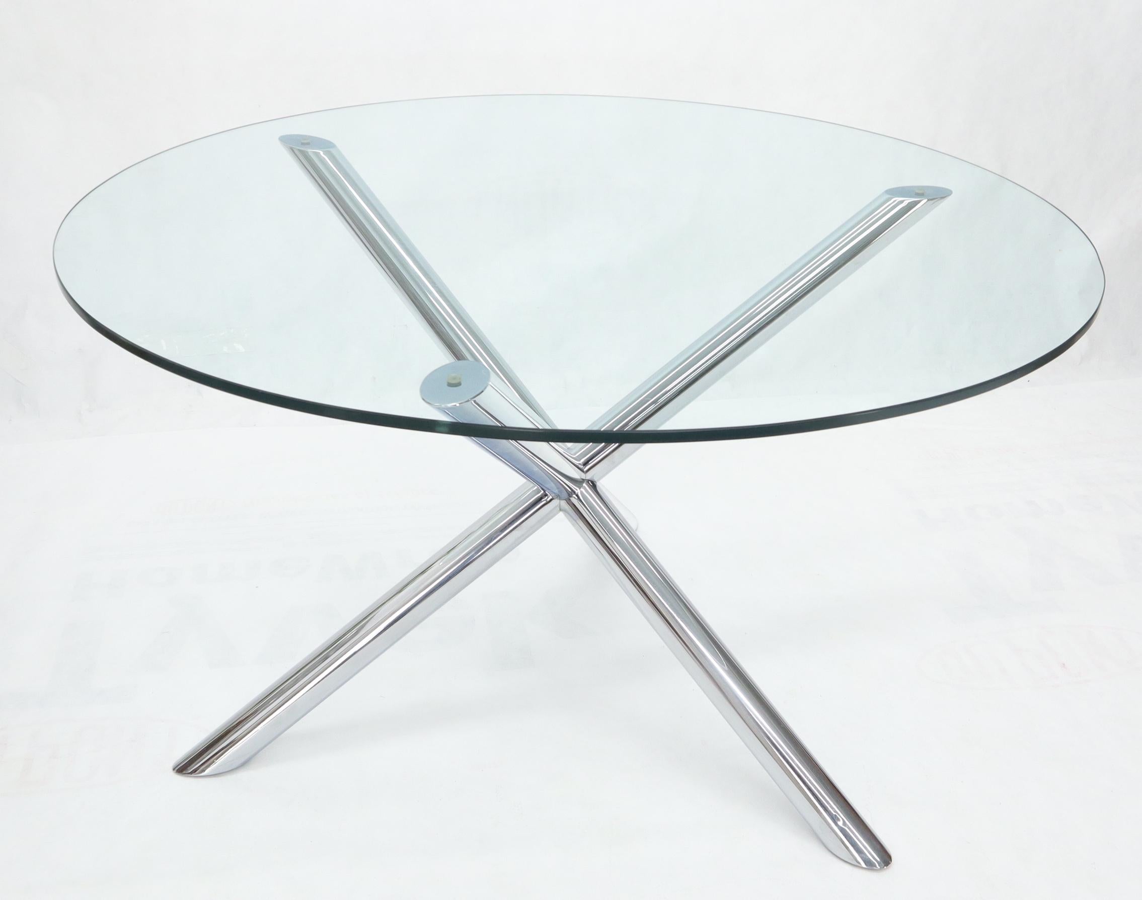 Large Mid-Century Modern polished chrome jack base round glass top dining table.