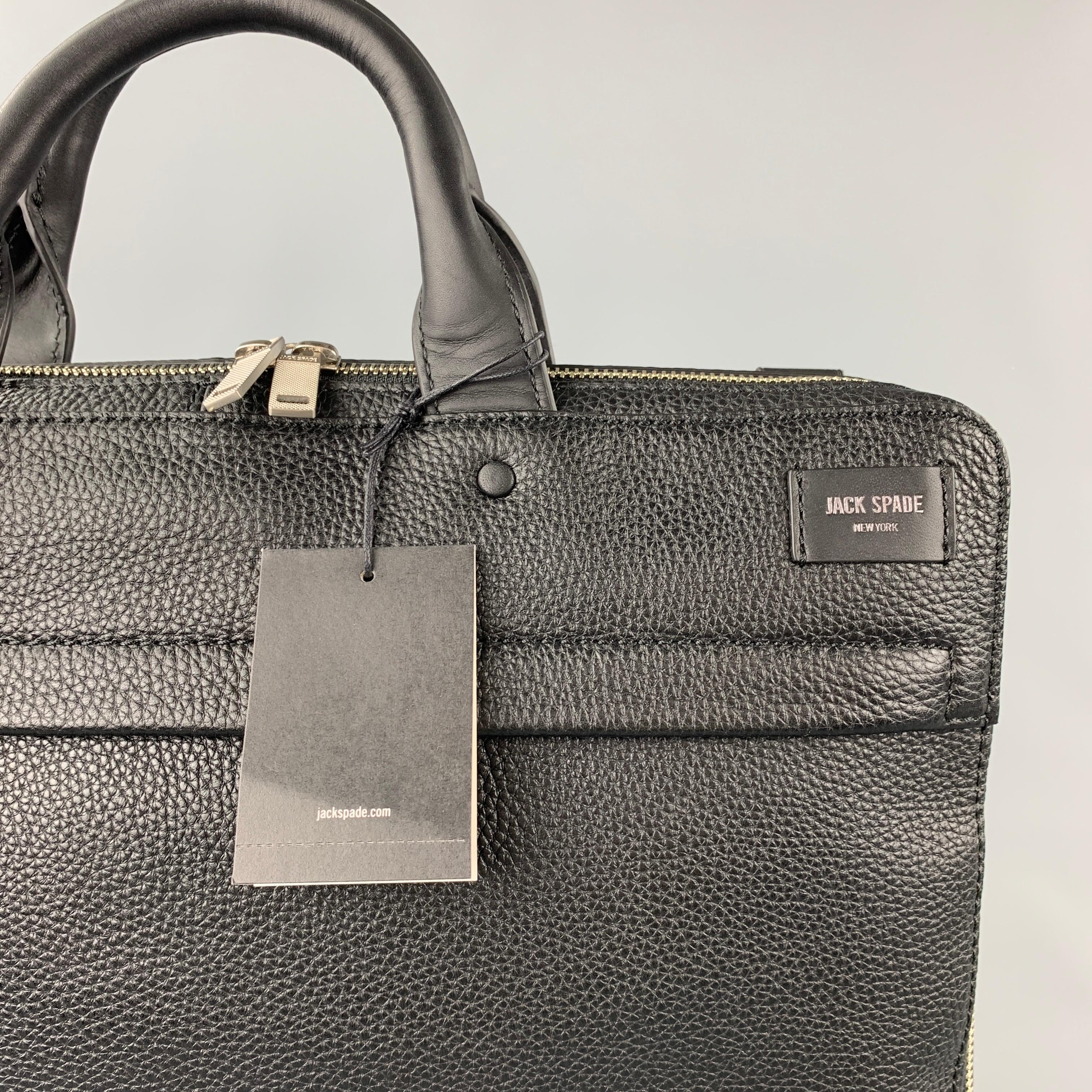 JACK SPADE laptop bag comes in a black pebble grain leather with a khaki interior featuring a shoulder strap, top handles, inner slots, and a zip up closure. Comes with dust bag.

Brand New. 
Original Retail Price: $398.00

Measurements:

Length: 16