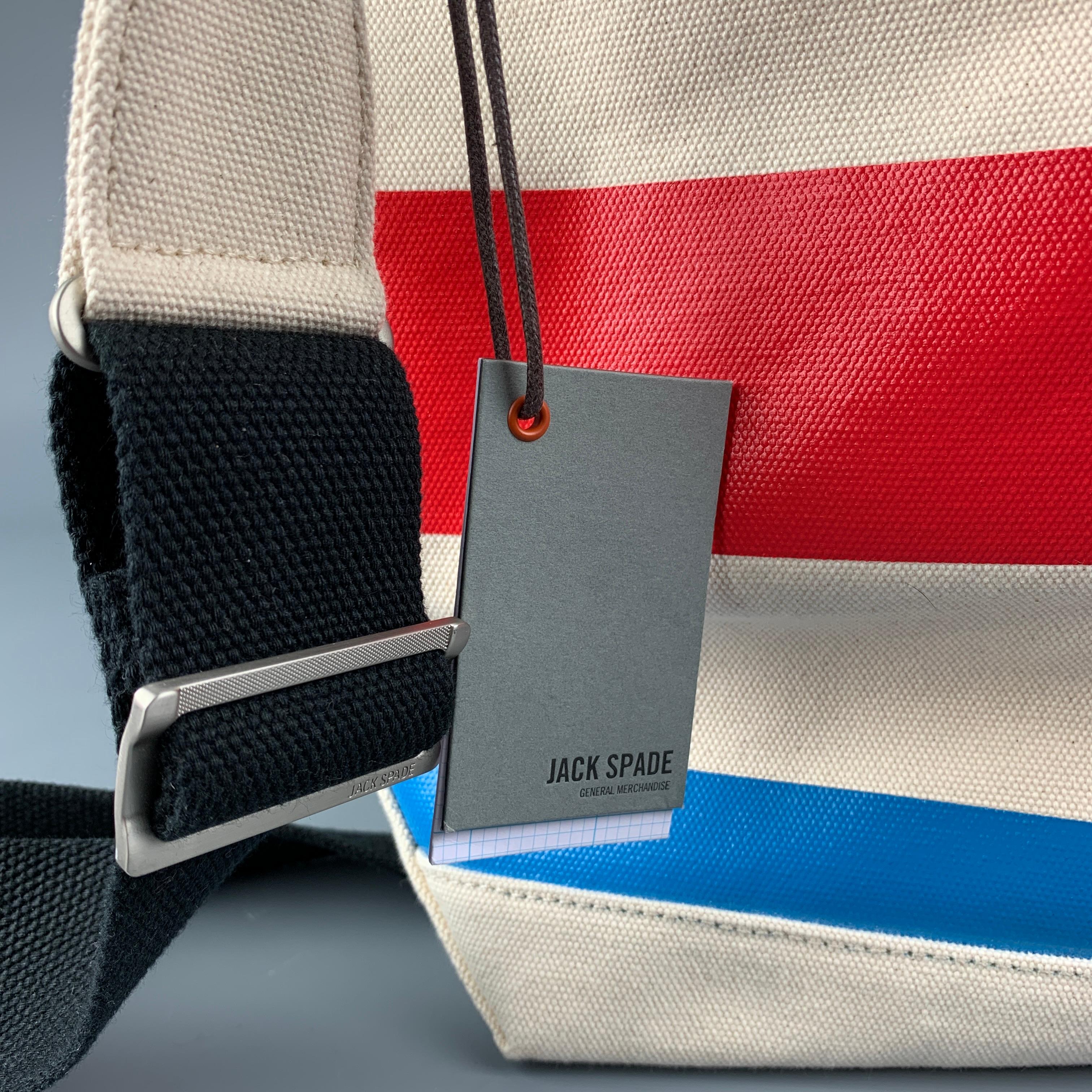 JACK SPADE bag comes in a multi-color stripe coated canvas featuring a tote style, top handles, removable shoulder strap, and a inner compartment.

New With Tags.

Measurements:

Length: 16 in.
Width: 6.5 in.
Height: 13 in.
Drop: 27.5 in. 