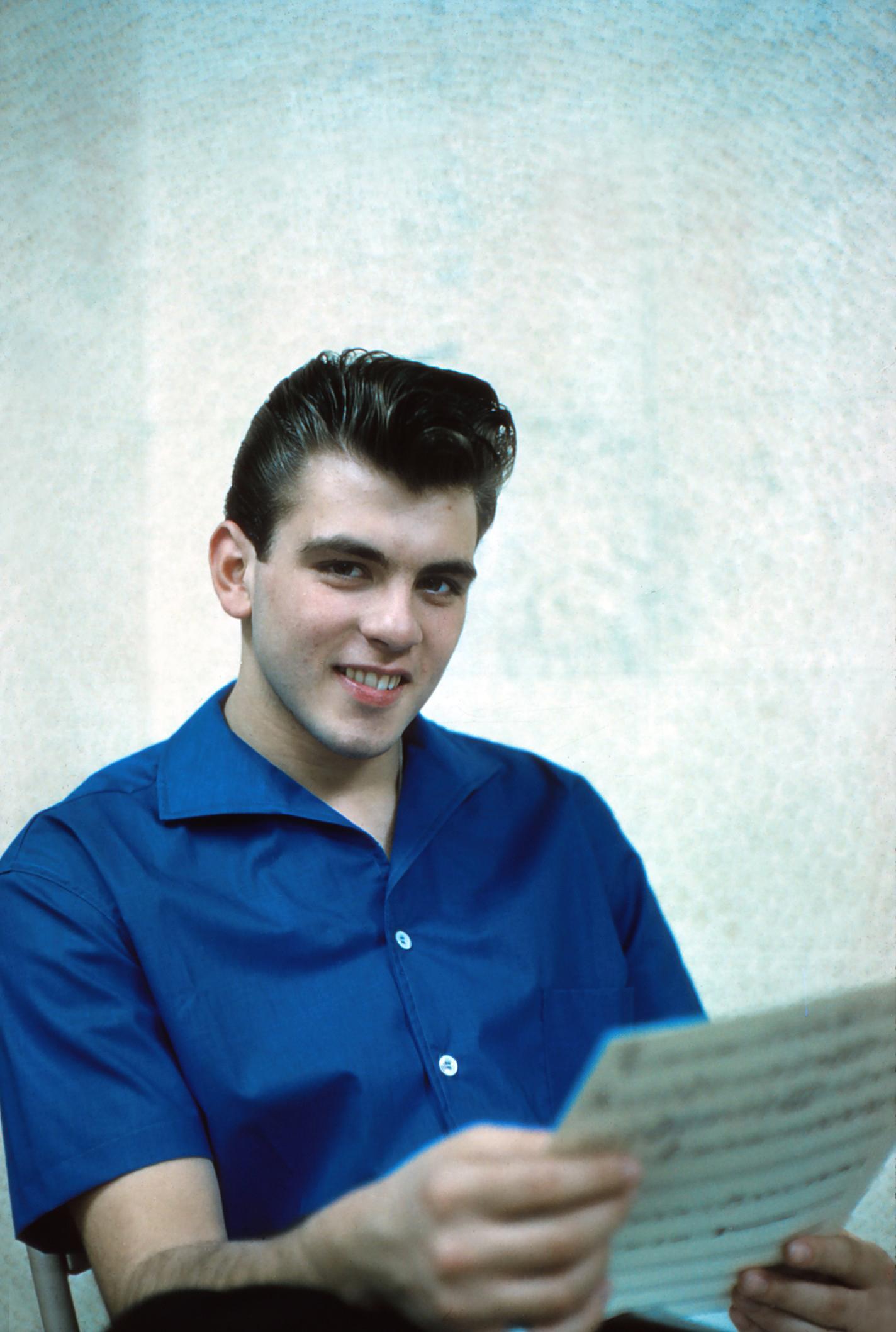 Jack Stager Portrait Photograph - Fabian Reading and Smiling Fine Art Print