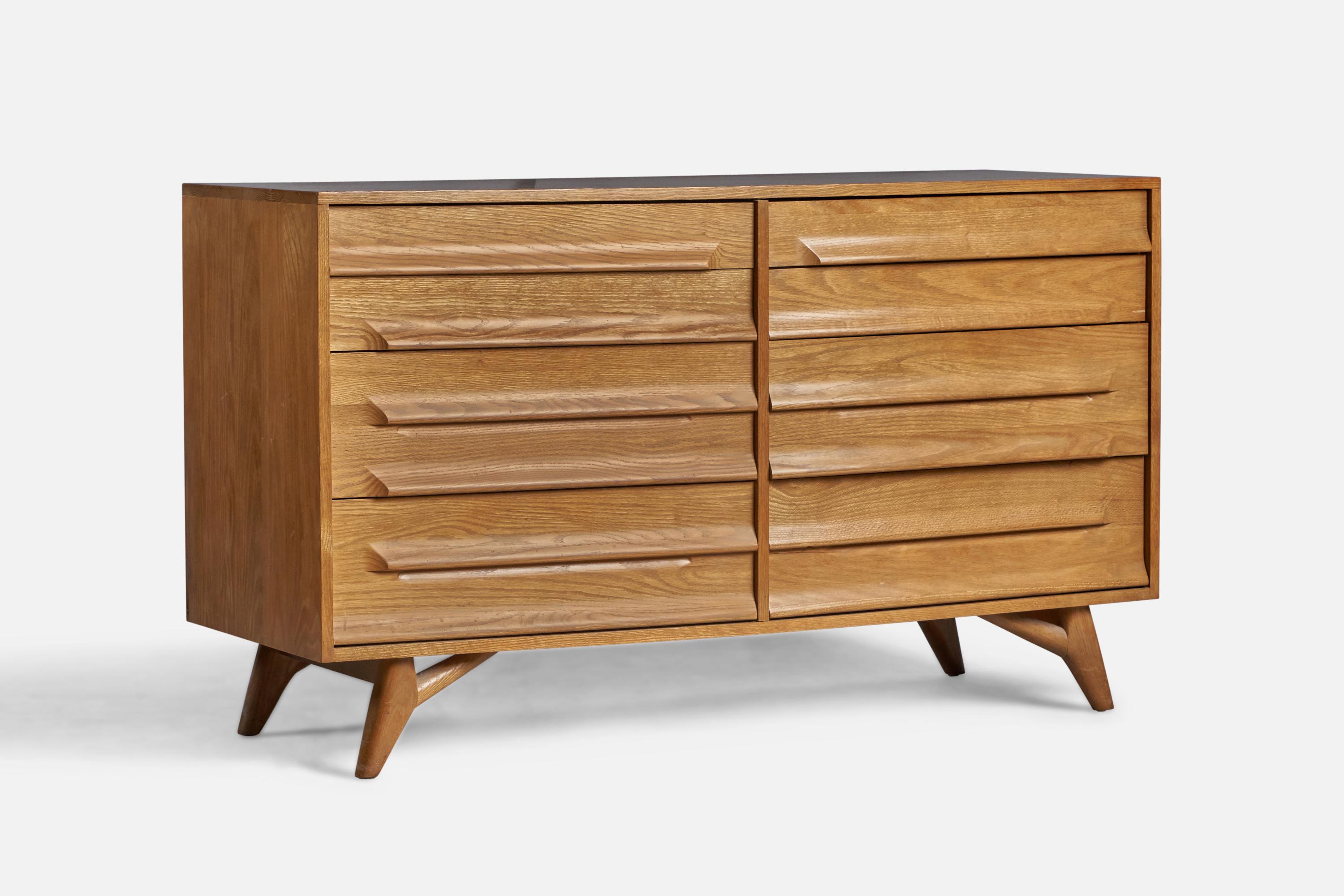 An oak dresser designed by Jack Van Der Molen and produced by Jamestown Lounge Co, USA, 1950s.