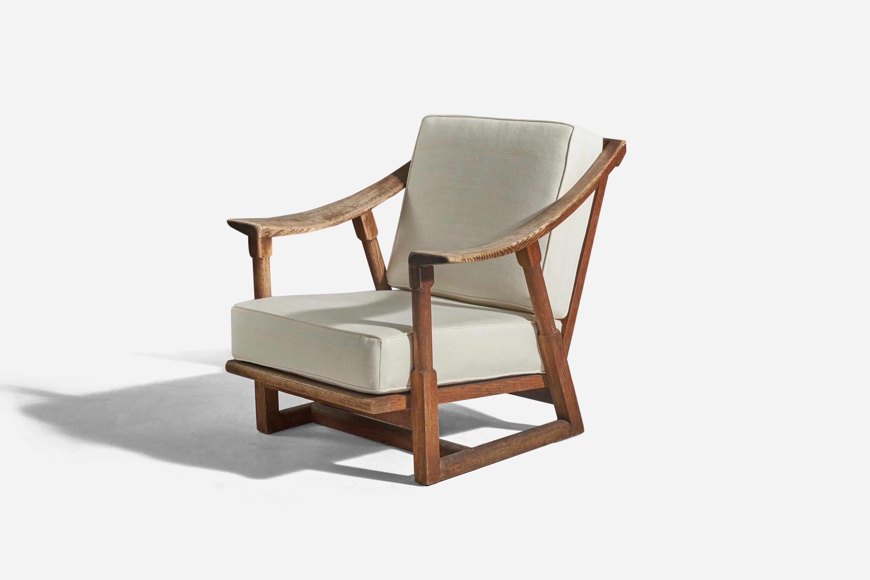 An oak and white fabric lounge chair designed by Jack Van Der Molen and produced by Jamestown Lounge Company, United States, c. 1950s. 





