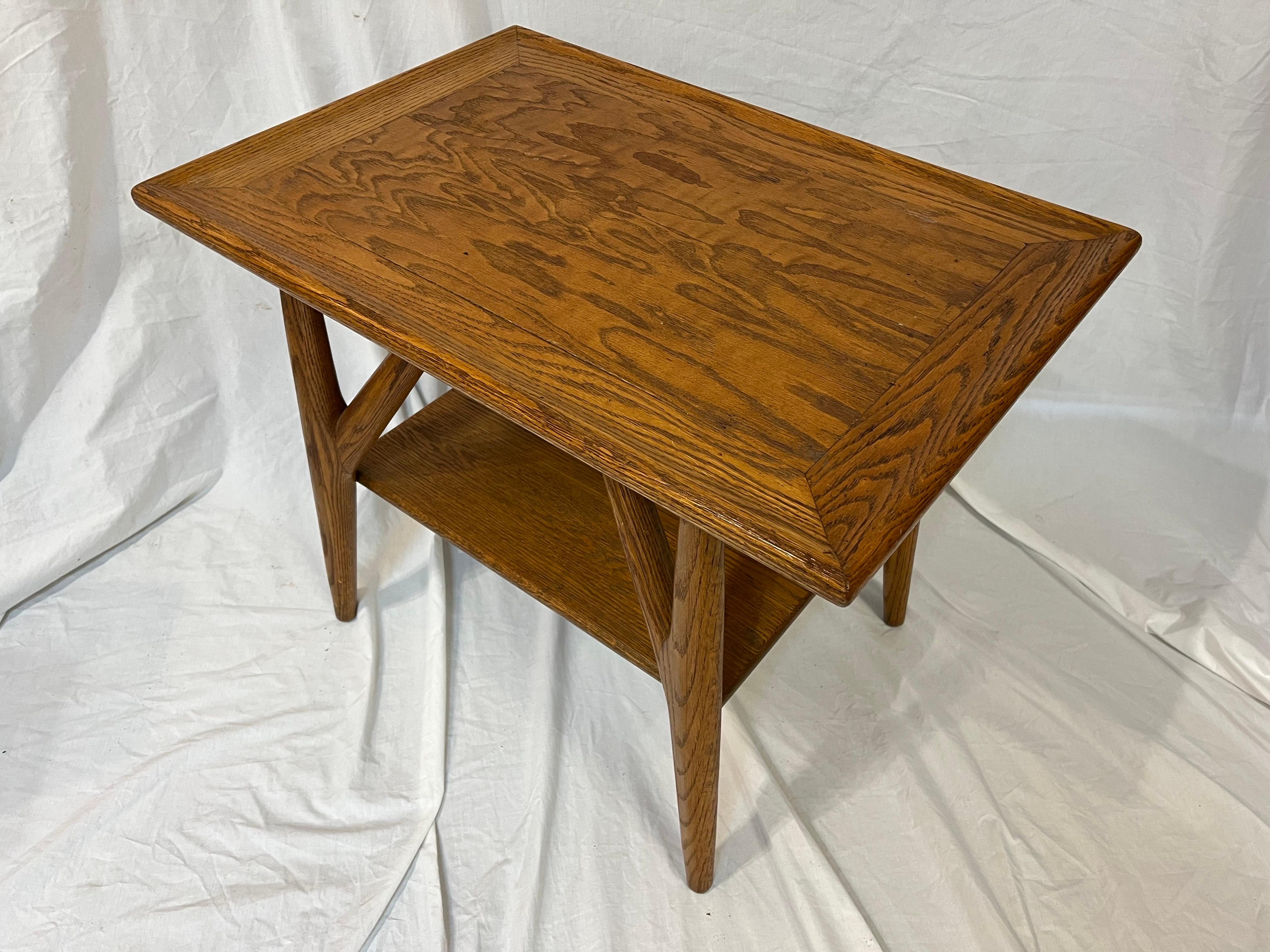 A Jack Van der Molen Mid-Century Modern oak wood side or end table. With a strong, pronounced grain and a confident style, this piece of American design history is ready for your interior. A bit of information from the Warehouse 414 website on the