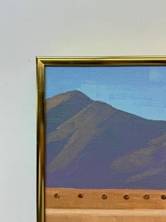 Southwestern scene, woman approaching Adobe