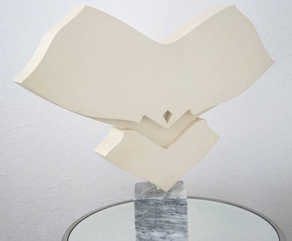 Abstract Sculpture by American Artist Jack Youngerman, from the Atlantic Ritchfield art collection. Abstract Form rotating on marble base. Initialed JY (Jack Youngerman, American, b. 1922), in cream paint, Hollow form. 20