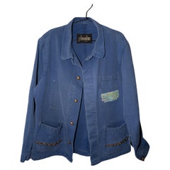 Veste bleue de travail français vieilli, à paillettes pastel et ornée d'une chaîne de poche