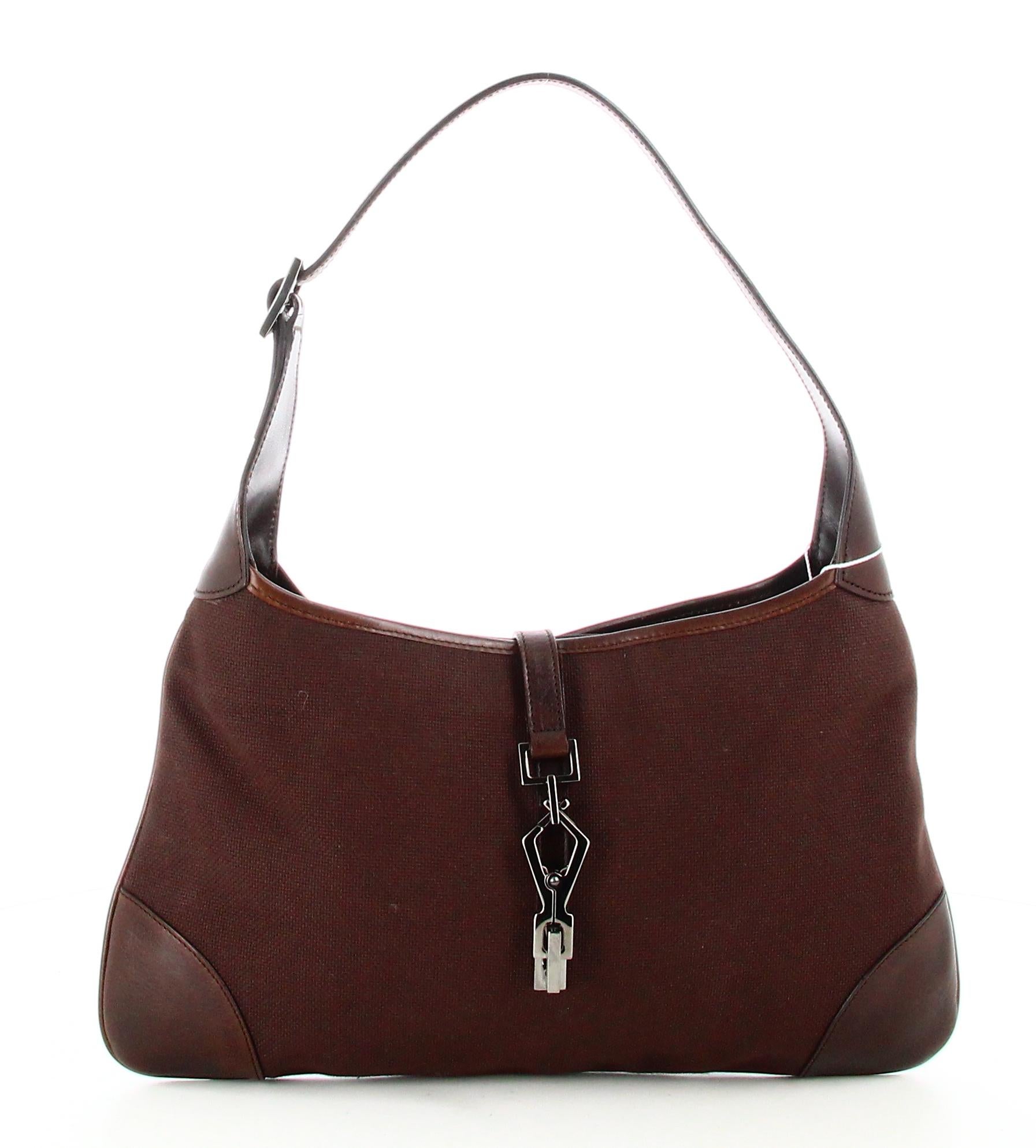Jackie Gucci Canvas Shoulder Bag

- Very good condition. Shows very slight signs of wear over time. 
- Gucci Jackie Handbag
- Brown leather and brown fabric 
- Brown leather strap 
- Femroir : Silver hook
- Interior: Brown monogram lining plus
