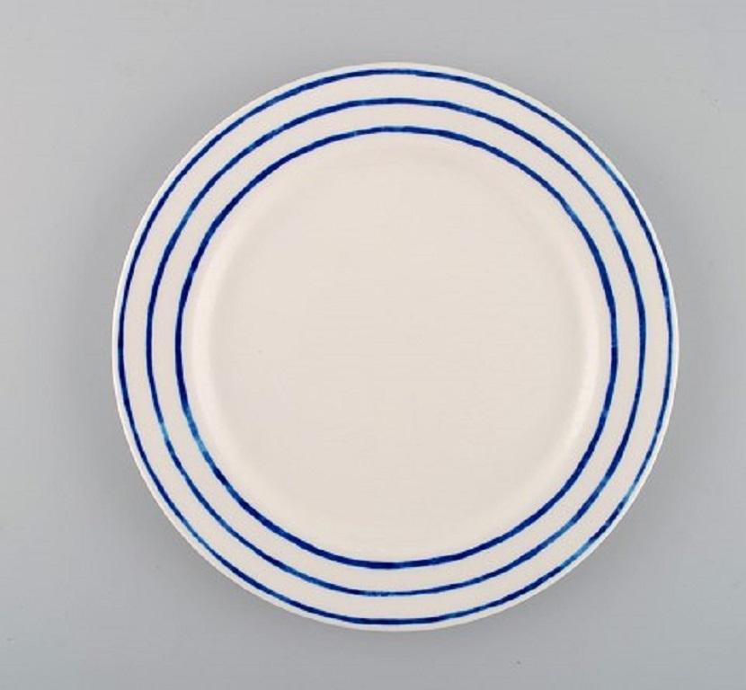 Jackie Lynd for Duka. Six plates in glazed stoneware with blue striped decoration.
Swedish design, early 21st century.
Measures: Diameter 21.3 cm.
In excellent condition.
Stamped.