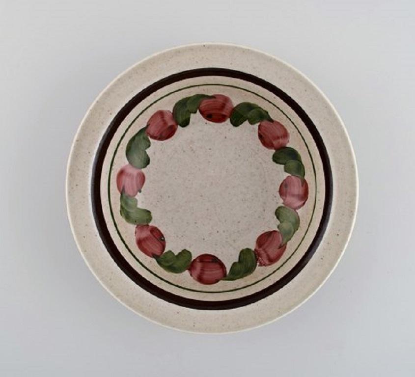 Jackie Lynd for Rörstrand. 14 Birgitta deep plates in hand painted glazed stoneware, 1970s.
Measures: 19.5 x 4.5 cm.
In excellent condition.
Stamped.
1st factory quality.