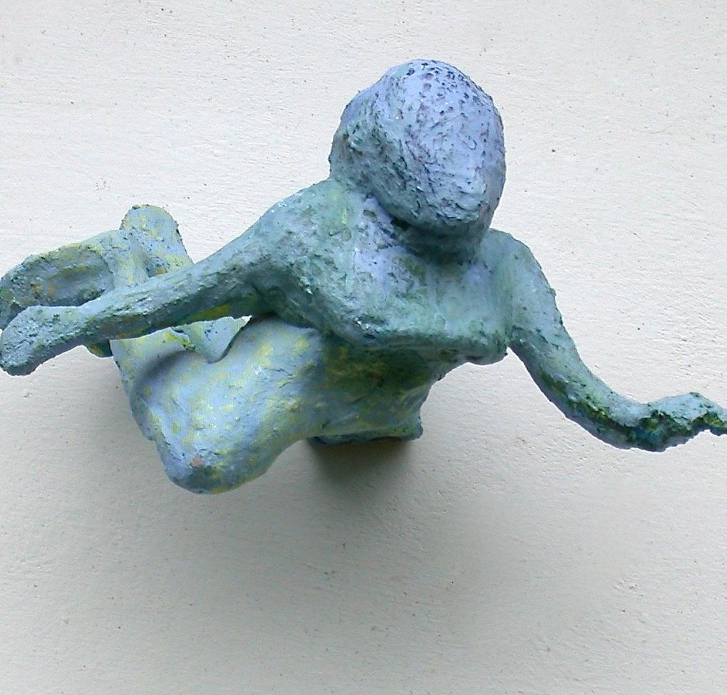 Jackie Shatz' wall sculptures encapsulate various suspended states of being. The images of swimming, floating and 