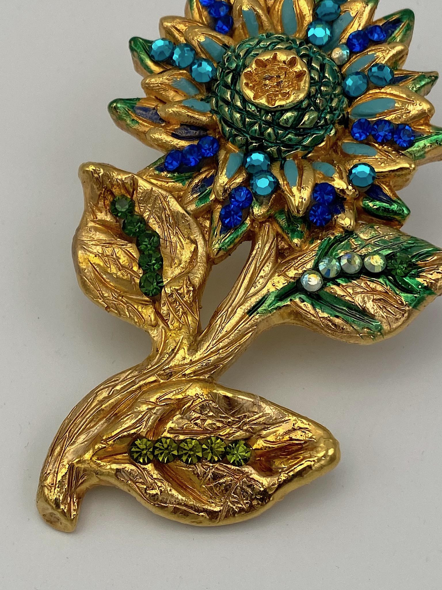 Produced predominantly in Paris in the 1980s and for a very short time, Jacky de G jewelry is highly collectable. It is original, bold in its design and often large in order to compliment the fashions of the day. This sculptural flower brooch is