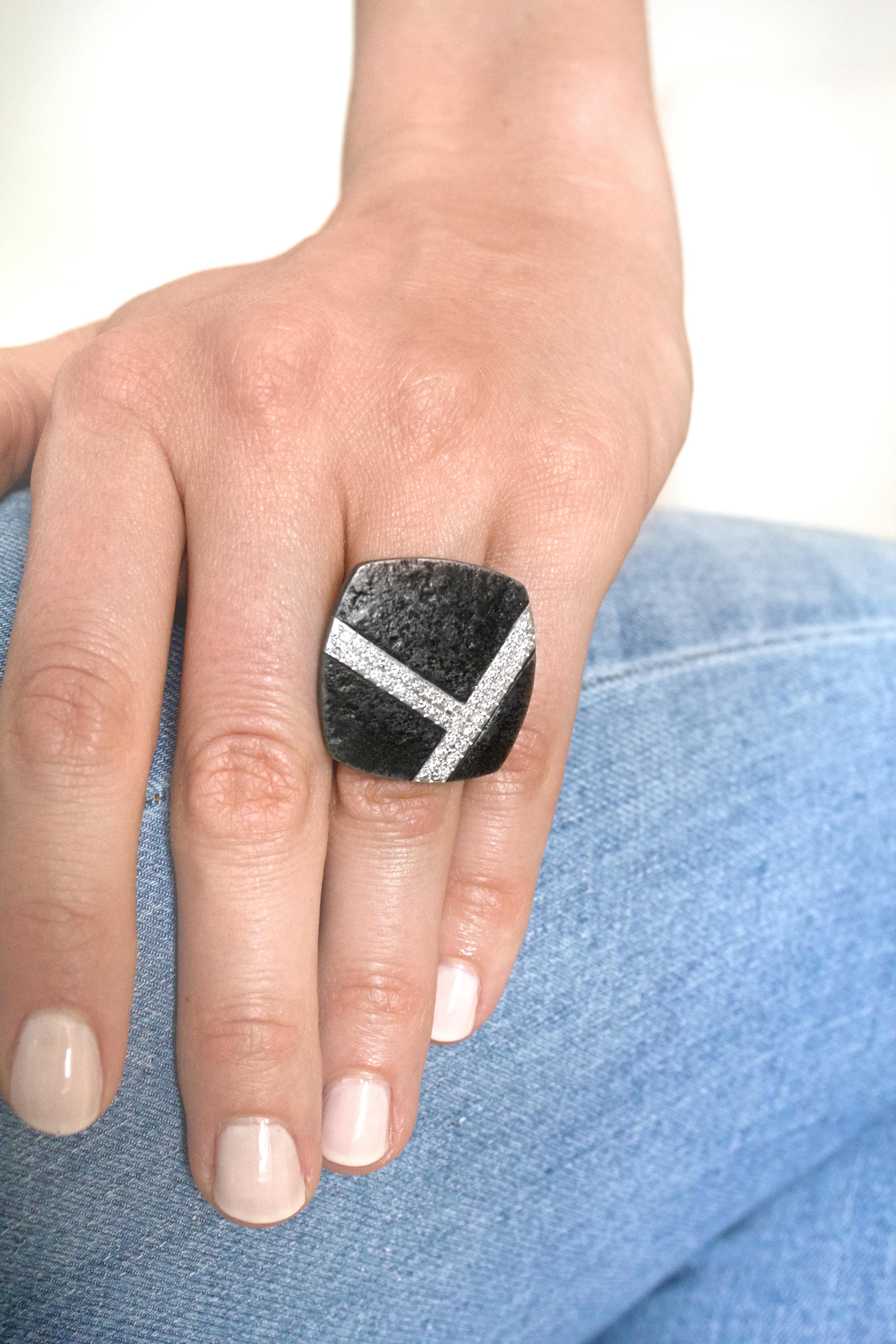 One of a Kind Cube Ring by award-winning jewelry artist Jaclyn Davidson hand-forged in weathered carbon steel featuring 0.70 total carats of shimmering round brilliant-cut F/vs1 white diamonds beautifully-set in 18k white gold atop an 18k yellow