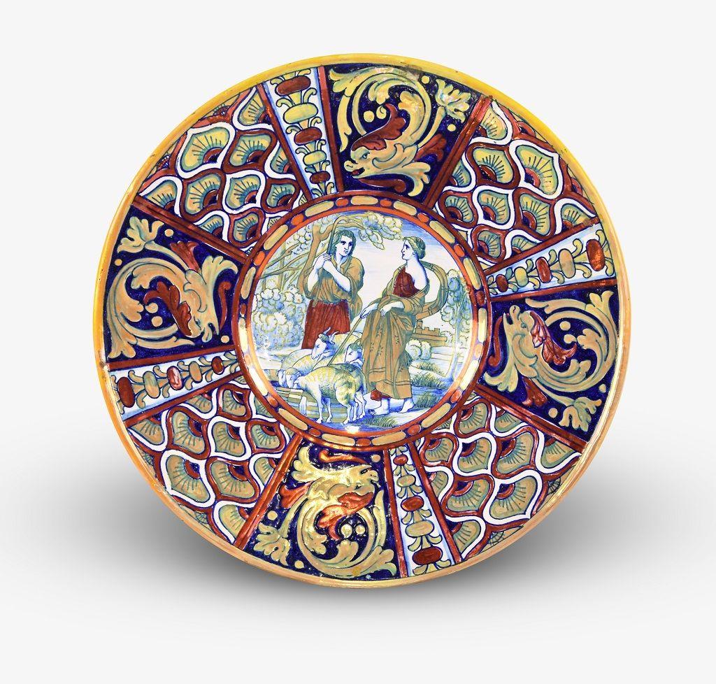 This Jacob and Rachel plate is an original decorative ceramic object realized in Italy in the 1930s.

This very rare ceramic plate is decorated with a sacral scene of the biblical characters of Jacob and Rachele.

The pale was realized by
