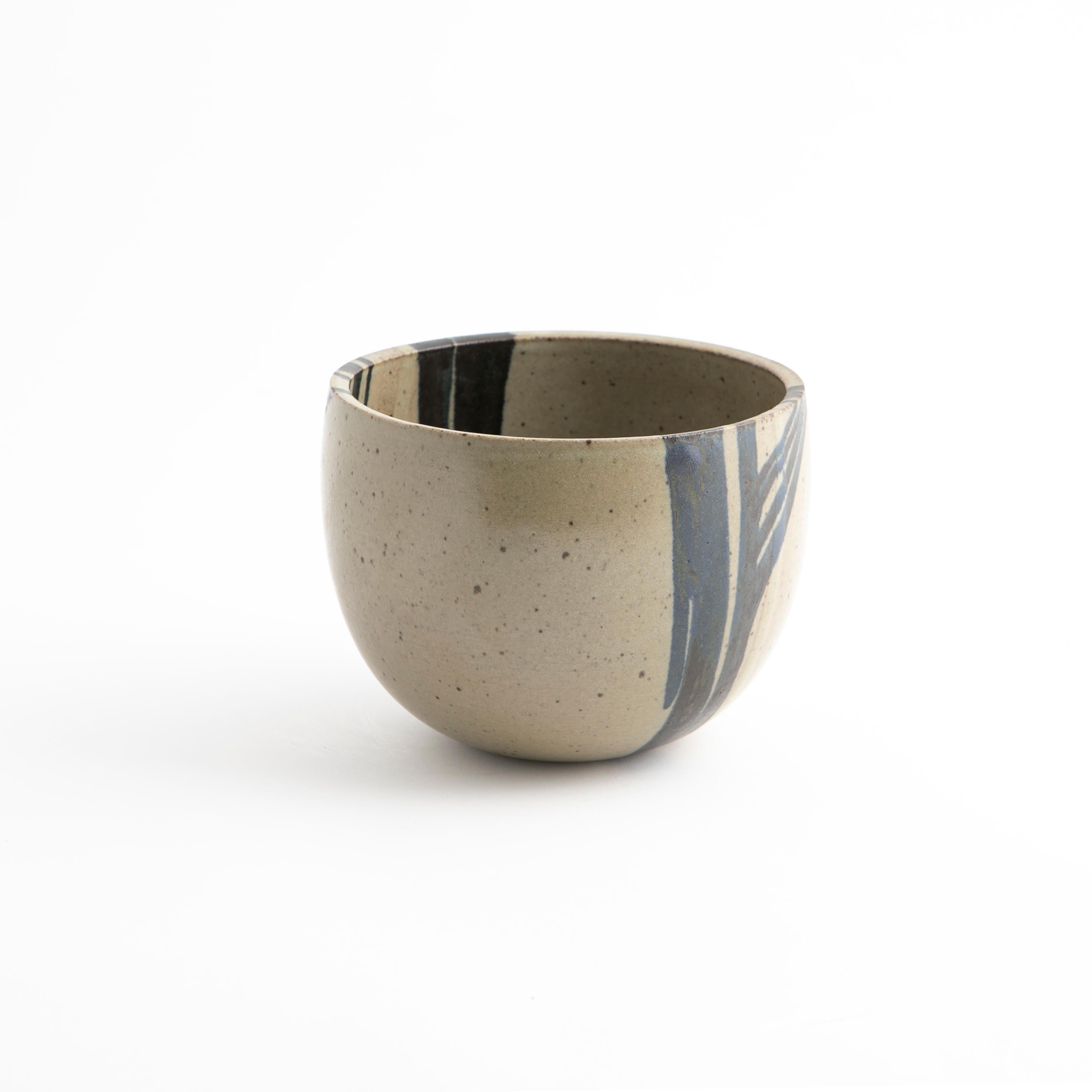 Jacob Bang, Danish 1932-2011
Bowl in stone wear with grey, blue and black glaze. H: 16 cm.
Made in Jacob Bang's own studio during the 1960s-1970.
Marked on the base.
Jacob Bang was a Danish ceramicist, designer and sculptor and the son of ceramic