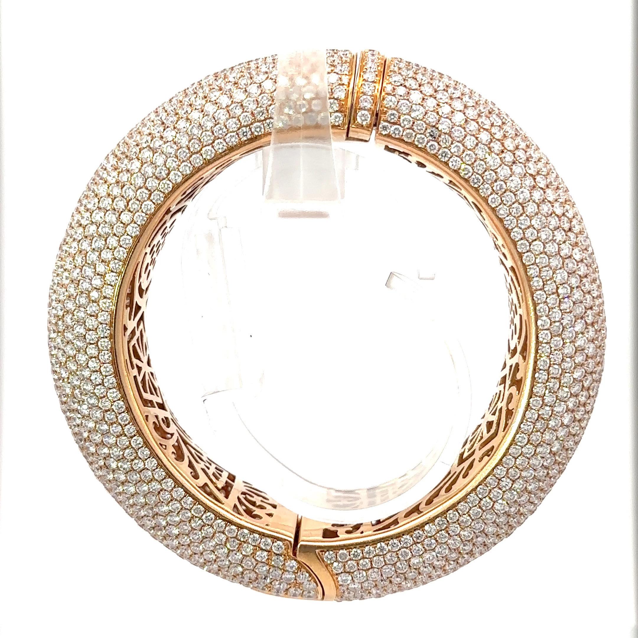 This an amazing & unique one-of-a-kind Jacob & Co. Diamond Bracelet Bangle made for Jennifer Lopez (as seen wearing in last picture). The bangle holds approximately 67 carats total weight of Diamonds. When worn, the top and outer edges of the