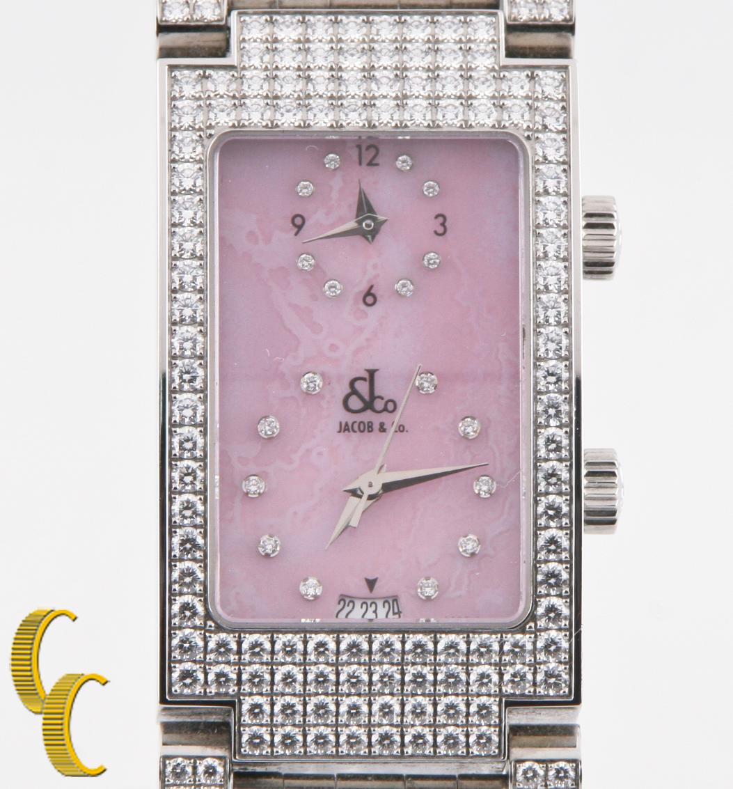 Model: Angel
Model #JCA18L
Serial #01020
Stainless Steel Case w/ Pave Diamonds
Total Diamond Weight = 3.30 ct
Width = 24 mm
Length = 44 mm
Lug-to-Lug Distance = 63 mm
Thickness = 10 mm
Pink Textured Two Time Zone Dial
Includes Date Feature at