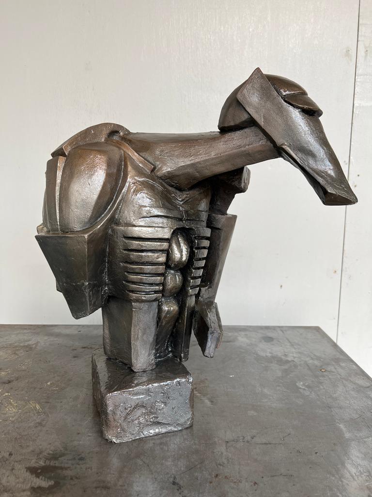 Rock Drill was originally displayed at the Brighton City Art Gallery from December 1913 to January 1914 
The sculpture consists of a plaster figure perched atop an actual rock drill. This combination of an industrial machine and a carved plaster