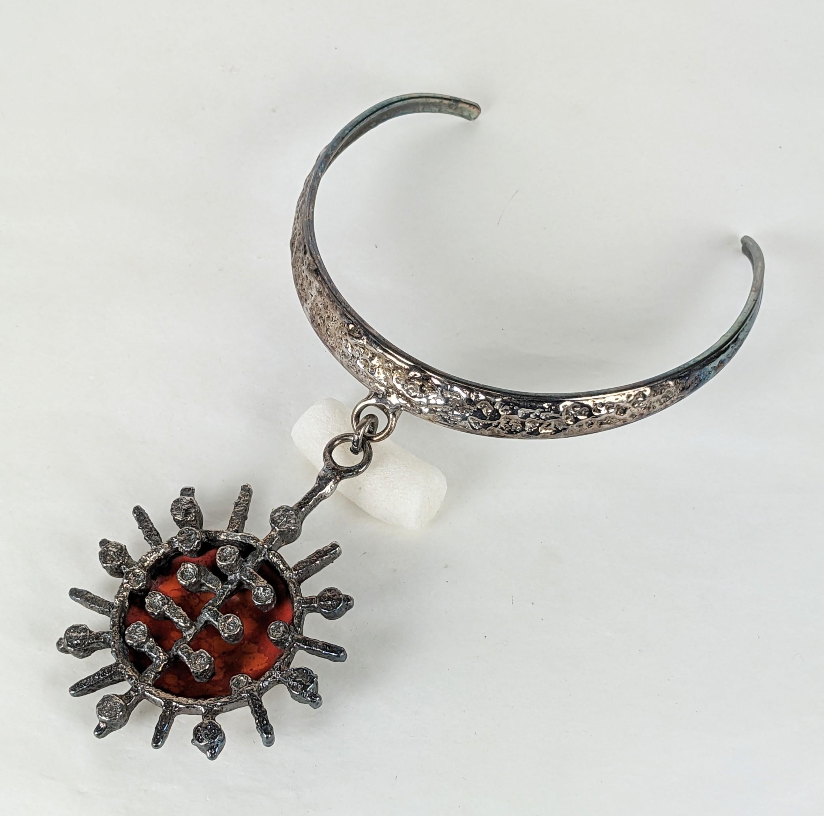Striking Jacob Hull Enamel Danish Pendant from the 1970's. Textured silverplated bronze collar with a deep Brutalist sunburst pendant with orange and red enamel interior. 
Hard Collar 10.5