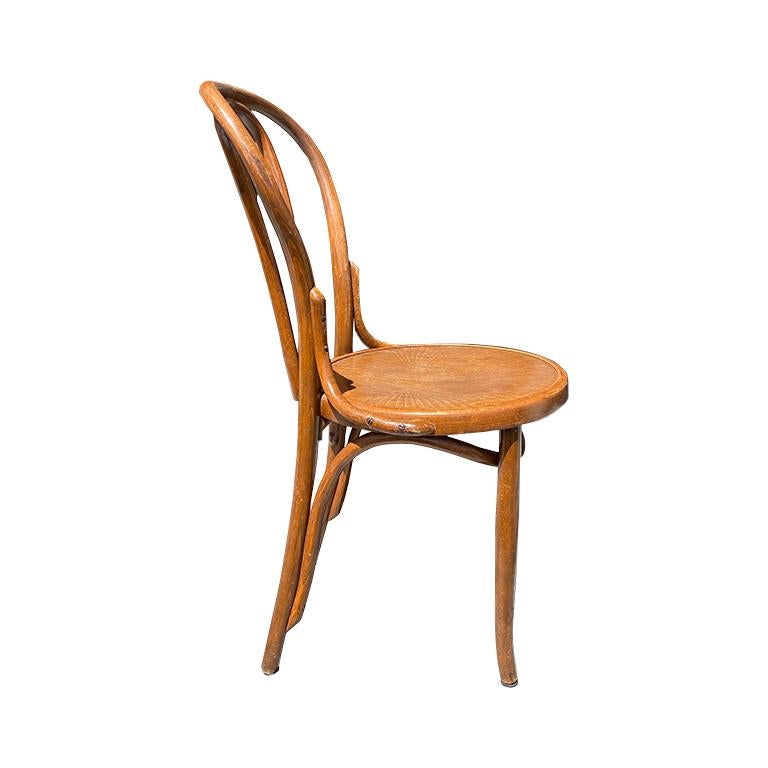 A gorgeous rare bentwood side chair by Jacob & Josef Kohn. This piece is perfect for use as a side chair, desk chair, or dining chair. Created by the iconic duo Jacob & Josef, or J & J Kohn, this chair will be a fabulous addition for any design