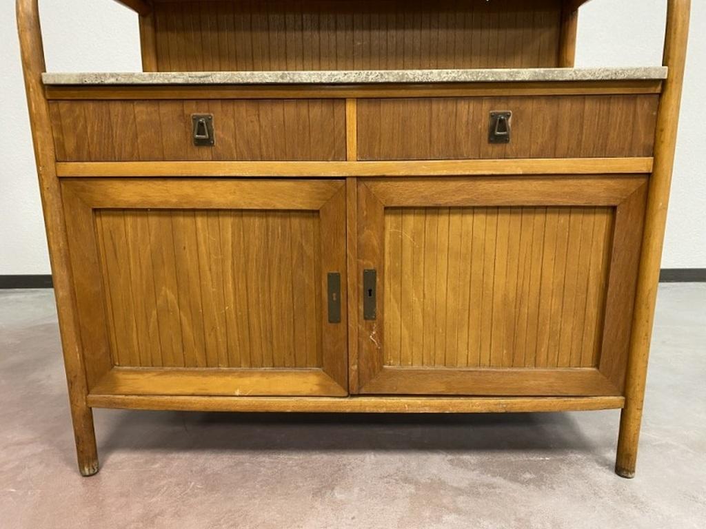 Storage cabinet by Jacob & Josef Kohn with marble top. In original condition.