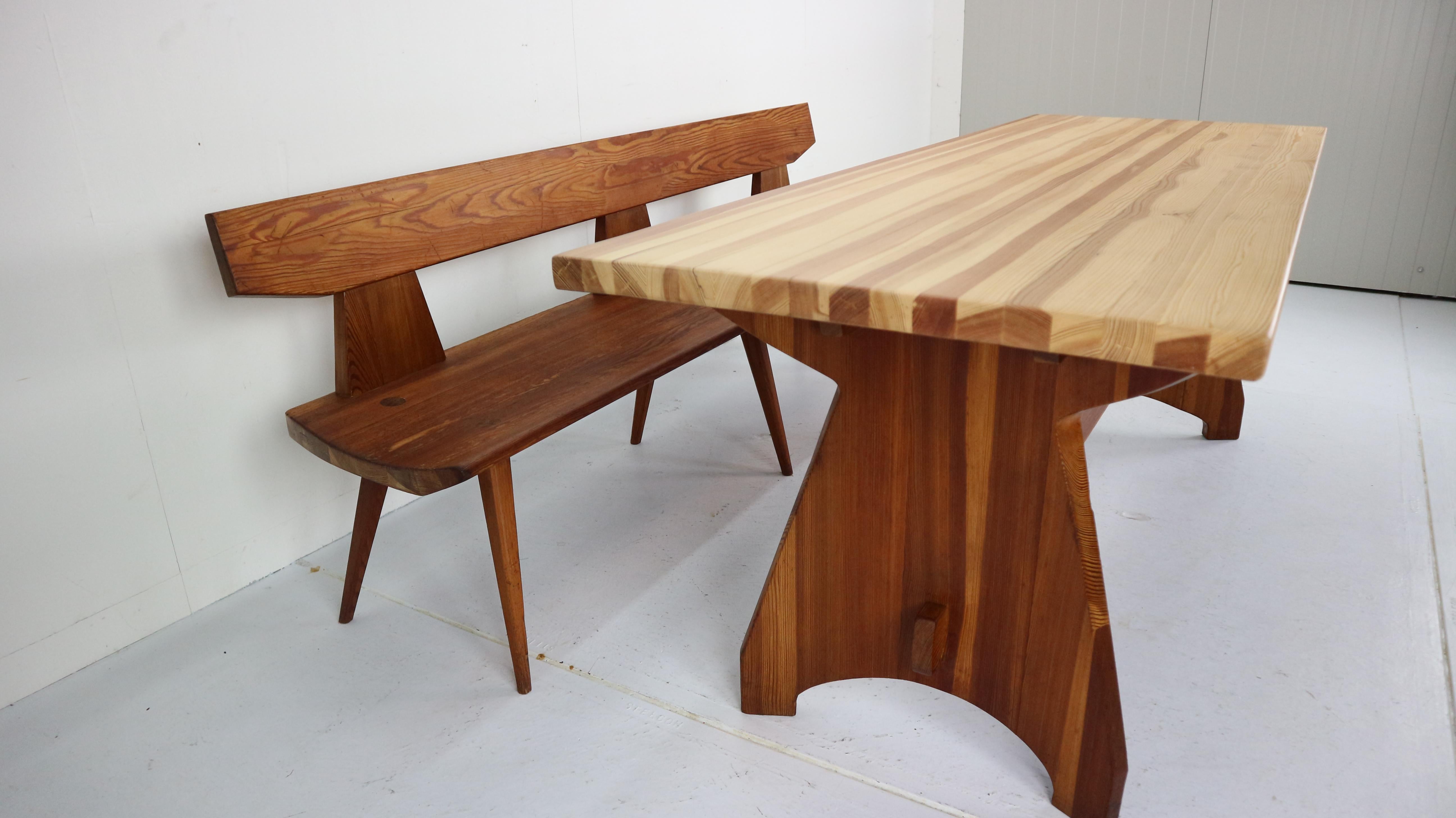 Handcrafted pine wooden bench and matching table by Jacob Kielland Brandt, 1960s for Christiansen, Denmark.
This is a recognizable Scandinavian Modern period piece by its specific shape, elegant curves and construction method. The tabletop is