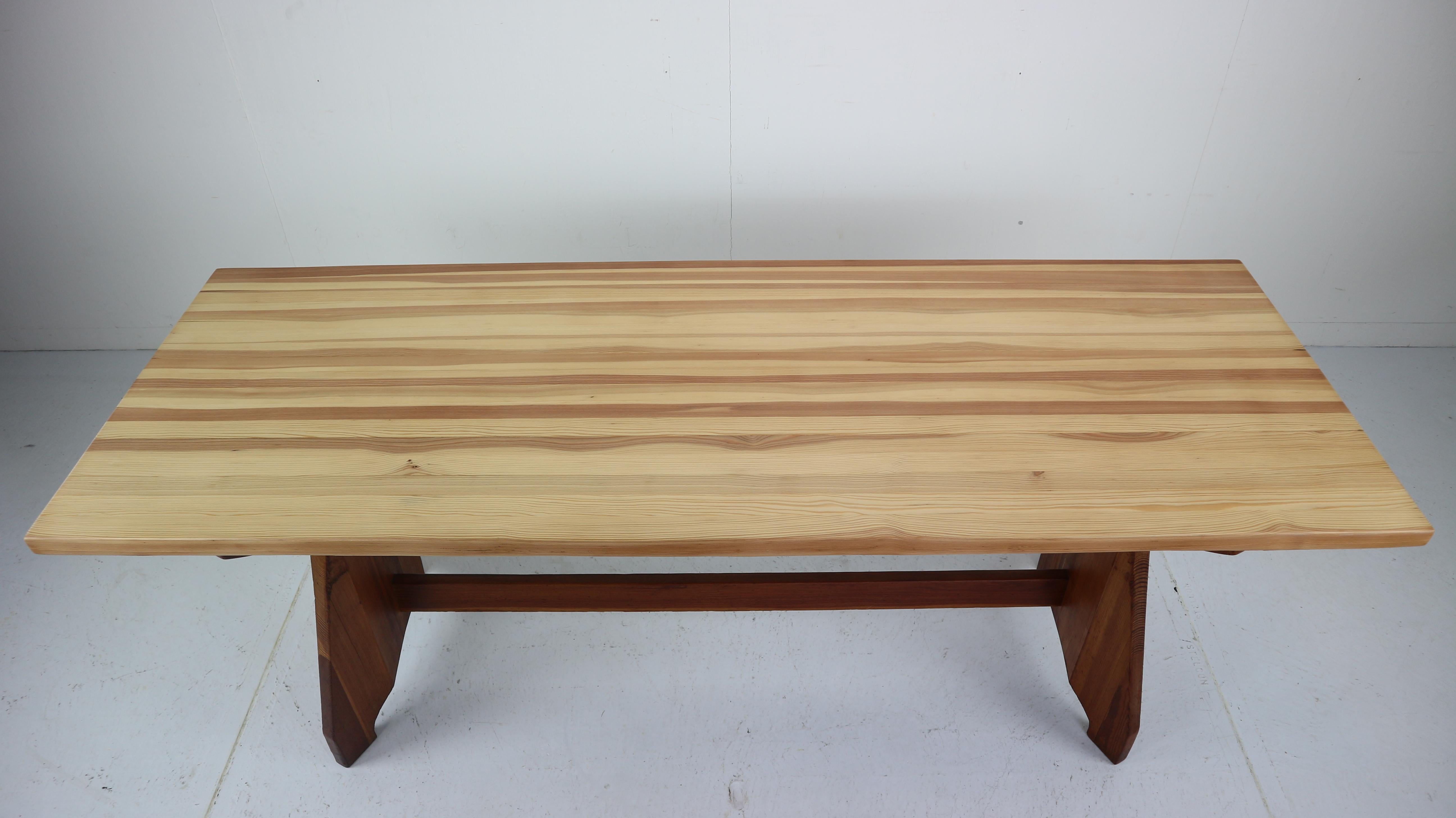 Handcrafted pine wooden table by Jacob Kielland Brandt, 1960s for Christiansen, Denmark.
This is a recognizable Scandinavian Modern period piece by its specific shape, elegant curves and construction method. The tabletop is refurbished and