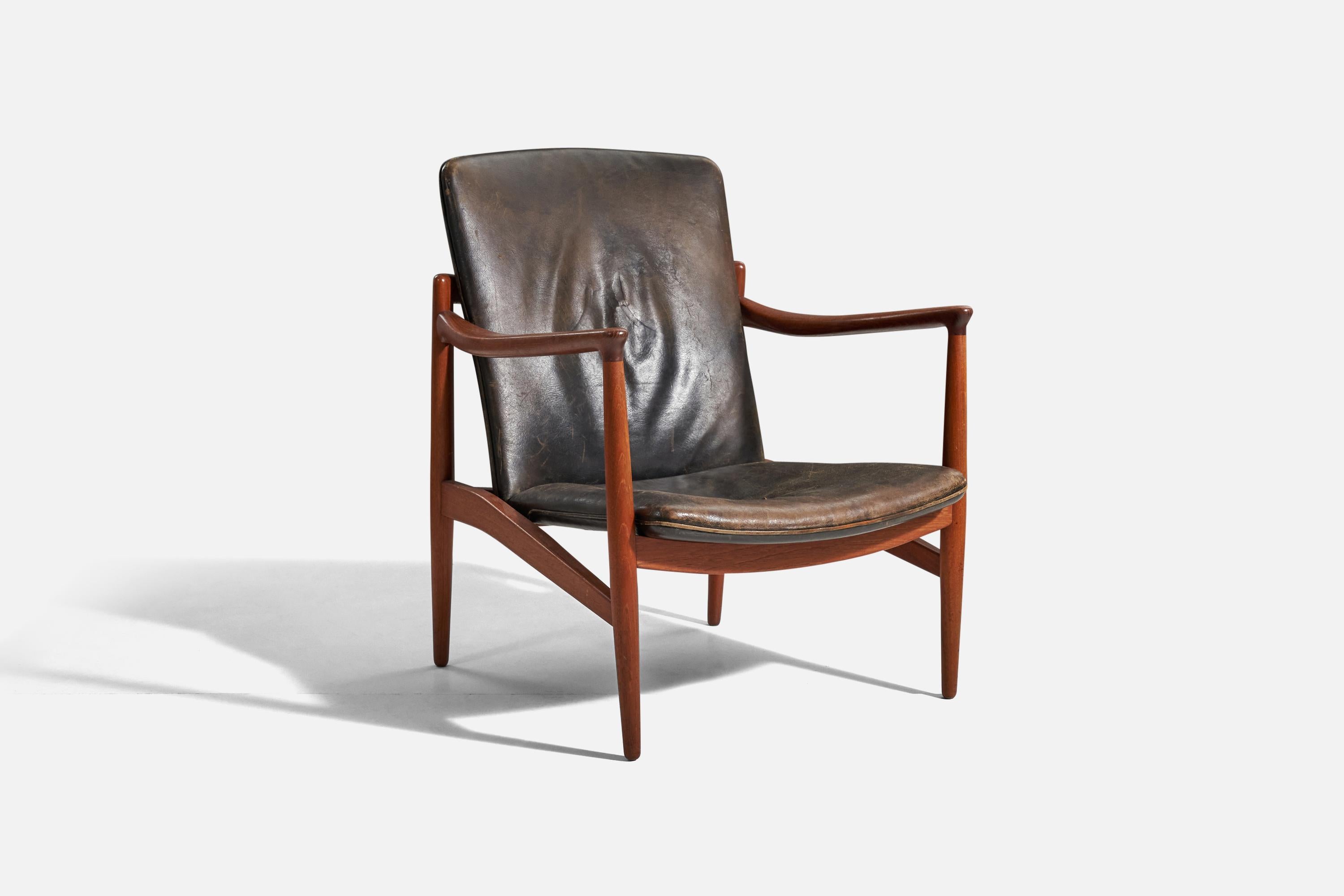 Chaise de salon réglable en teck et en cuir, conçue et produite par Jacob Kjaer, Danemark, 1945.